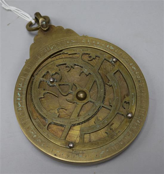 An Islamic brass astrolabe